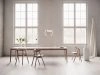 Expand dining table by Sami Kallio for Northern featuring solid oak construction and smooth extension system