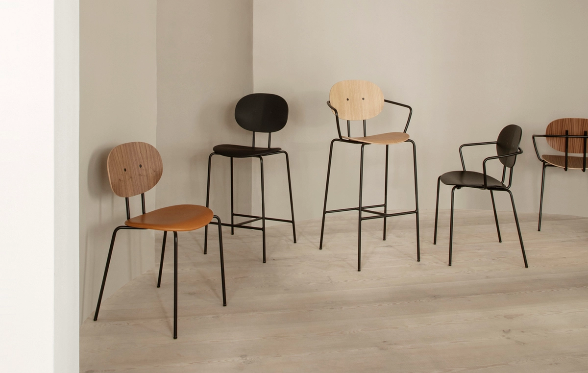 Sibast Furniture Piet Hein Chair collection featuring superellipse design with walnut and oak veneer options