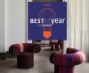Big Talk modular lounge chair by Adam Goodrum featuring colorful striped upholstery and curved design
