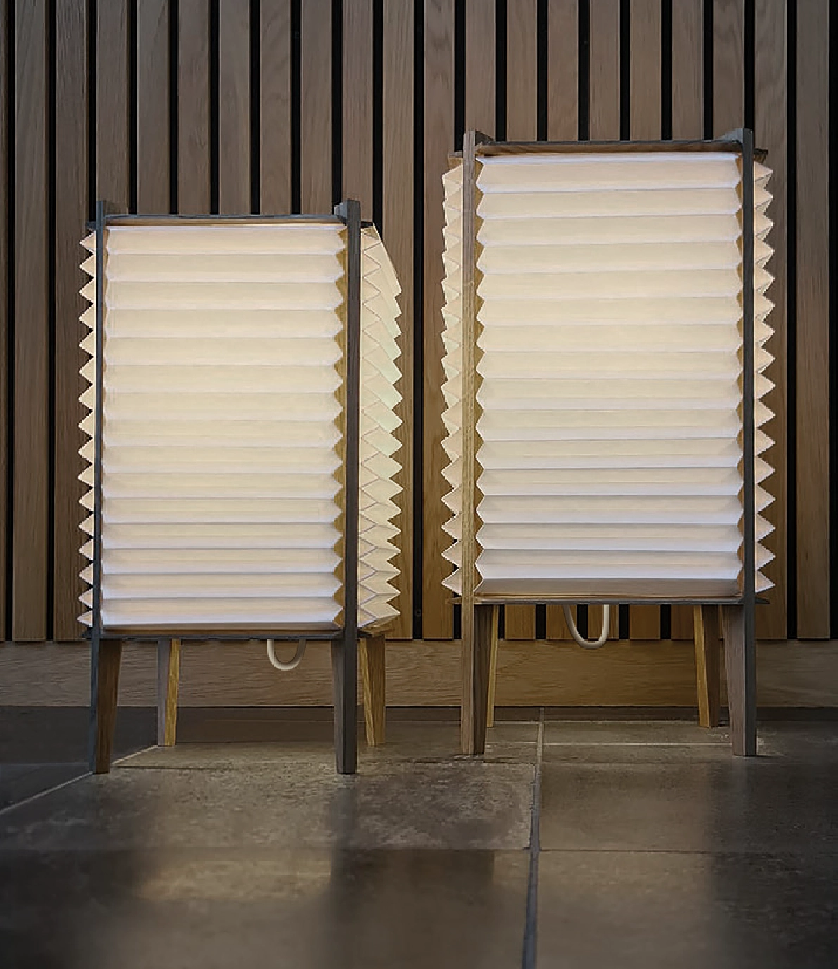 Le Klint Bee Hive lamp featuring traditional Japanese inspired design with hand-folded paper and oak frame