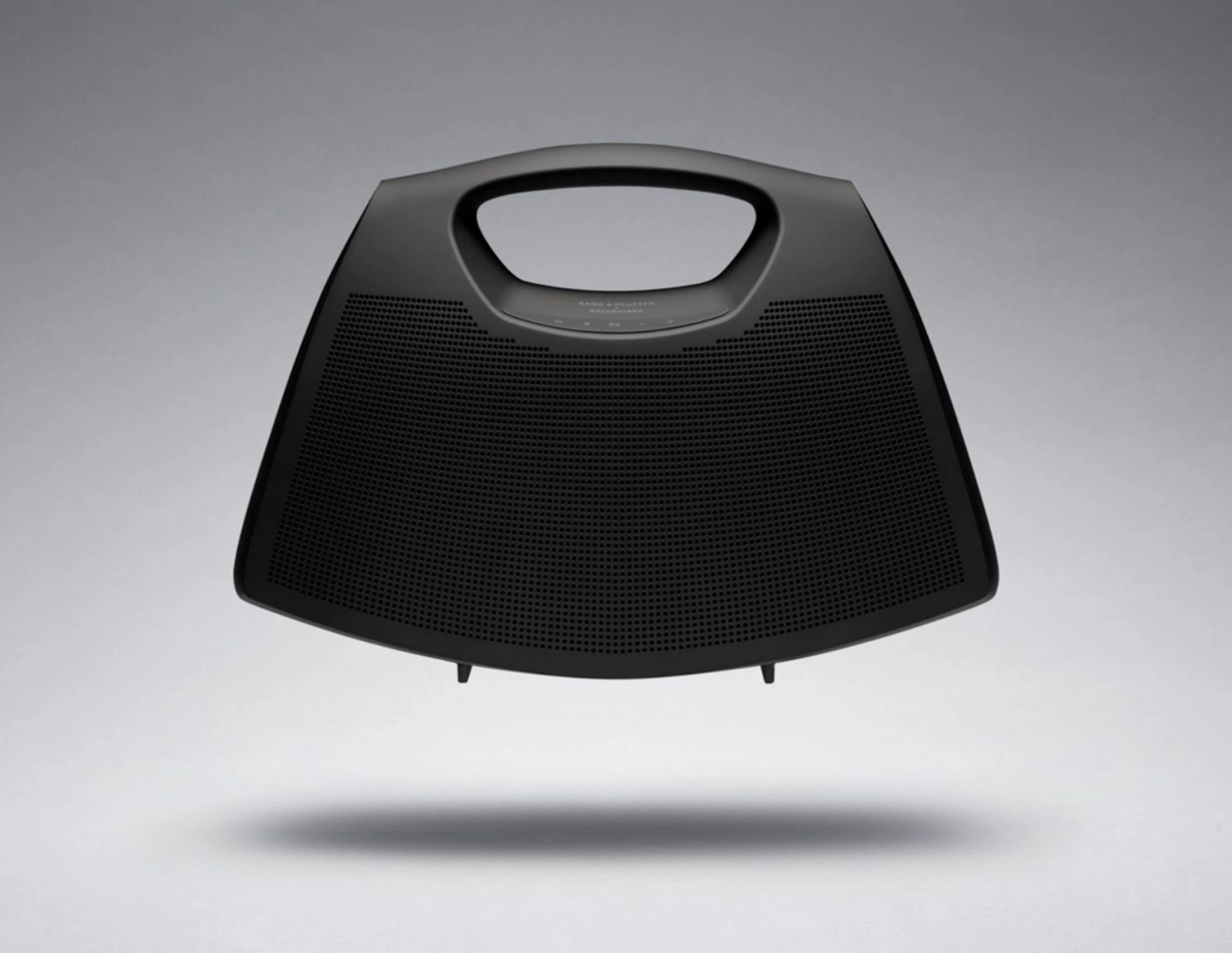 Balenciaga Bang Olufsen Speaker Bag luxury collaboration featuring aluminum construction and Bluetooth audio