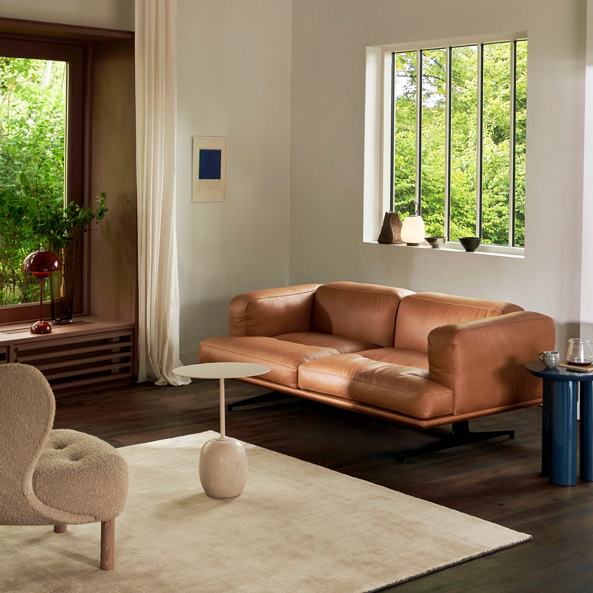 Anderssen Voll Inland sofa overview &Tradition showing low-form deep seating steel base floating design architectural frame