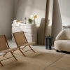 &tradition X lounge chair by Hvidt & Mølgaard featuring laminated oak frame and natural rattan seat