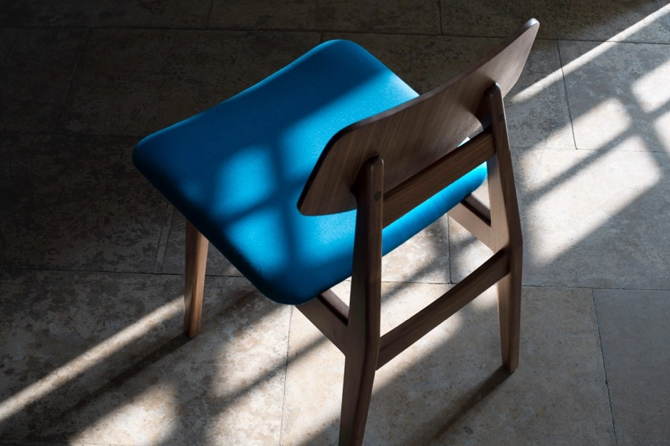 Jens Risom C140 chair by Stellar Works featuring walnut frame and Kvadrat upholstery in contemporary setting
