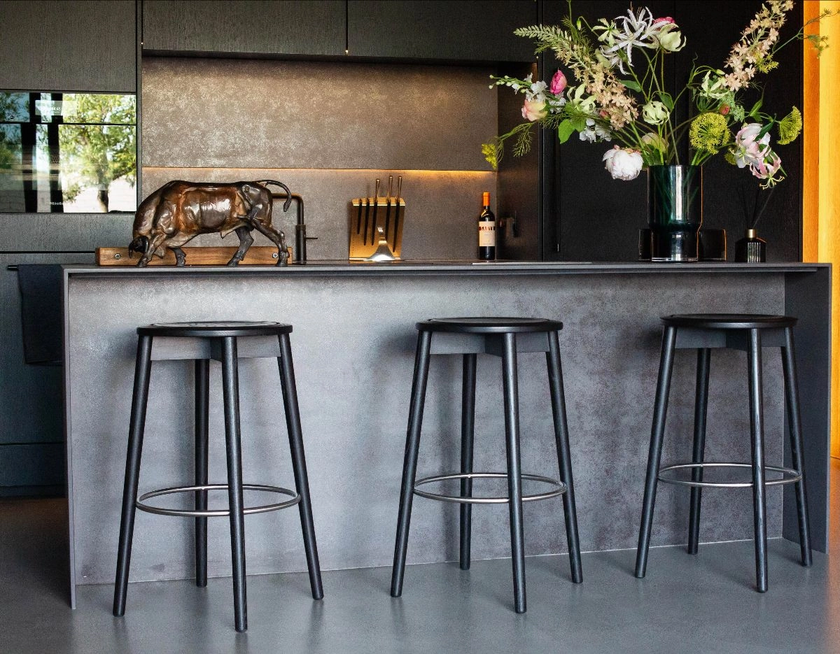 Boris Berlin Tranquebar bar stools collection Ca'lyah showing circular seats embroidered patterns Tamil Nadu craftsmanship