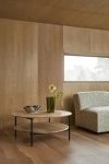 Mio occasional table by Takagi Homstvedt featuring circular oak top and lapped steel framework design