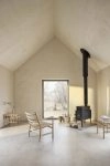 CH004 nesting tables by Hans J. Wegner featuring three graduated sizes with tapered legs and organic design details