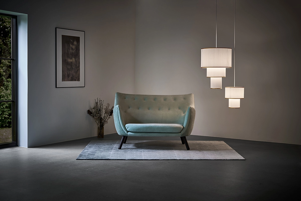 Plivello pendant lamp by Christian Troels for Le Klint showcasing multi-level paper pleated design in Danish lighting