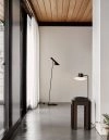 AJ Oxford table lamp by Arne Jacobsen featuring sleek stem and sculptural opal glass shade for Louis Poulsen