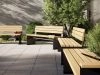 Perpendicular system by Thomas Bernstrand for Nola featuring angular wooden slats and steel frame construction
