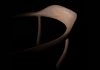 Bone Chair 44 by Finn Juhl showing organic sculptural form and floating seat construction