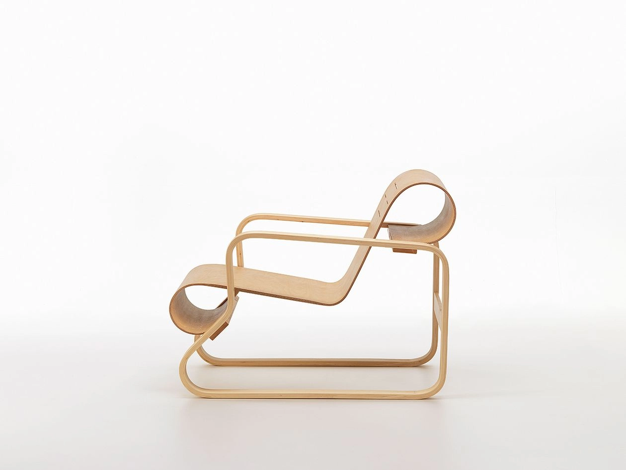 Anniversary edition of Armchair 41 featuring oiled birch wood construction designed by Alvar Aalto for Artek