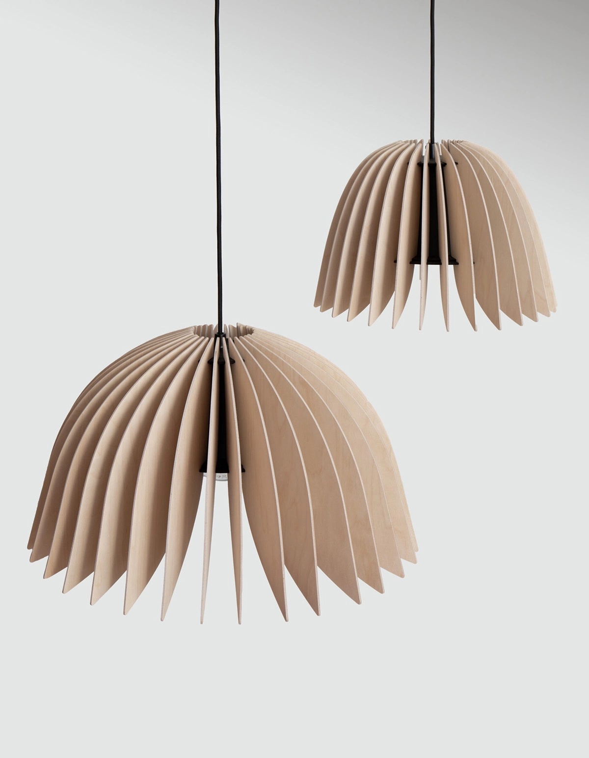 Verna lamp by Simo Serpola for Pilke displaying spring-inspired design elements and distinctive light distribution qualities