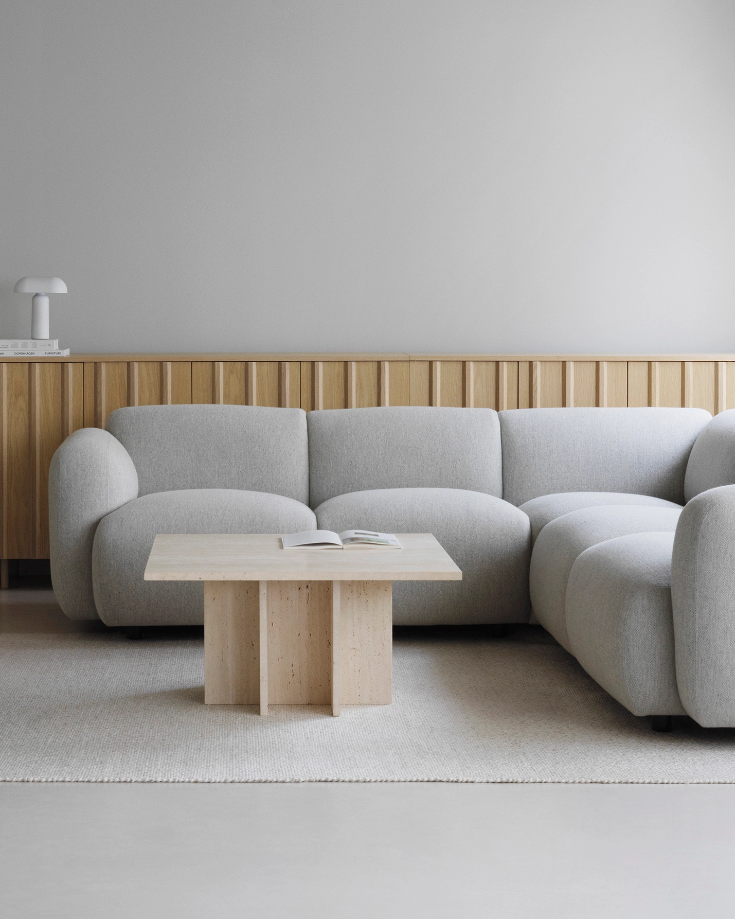 Jonas Wagell's minimalist Swell modular sofa system showcasing clean lines and versatile configuration options.