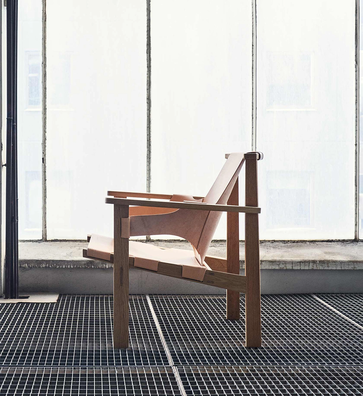 Historic Trienna armchair originally designed by Swedish architect Carl-Axel Acking reissued by Verk