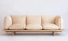 Innovative sofa design by Verk Projects featuring unique cushions suspended over sturdy glulam construction