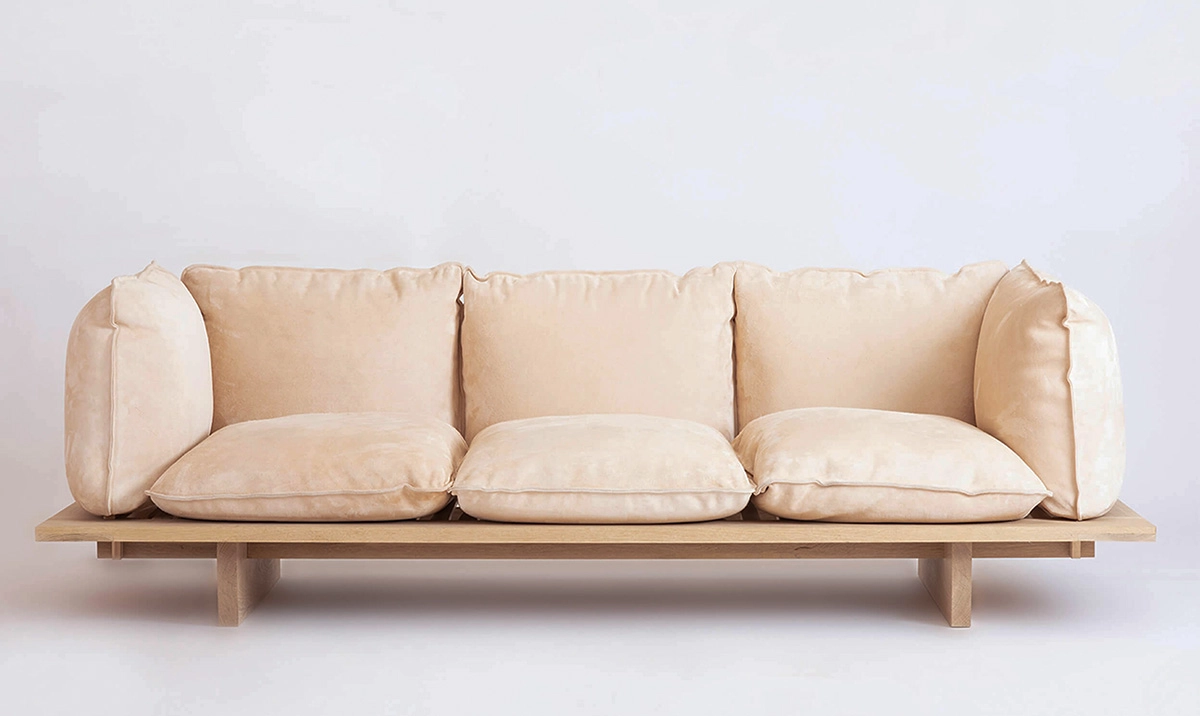 Innovative sofa design by Verk Projects featuring unique cushions suspended over sturdy glulam construction