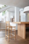 Comfortable Akademia bar chair by design duo Kaksikko for Nikari combining dining chair comfort with bar height