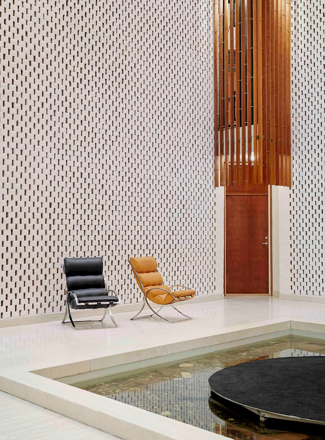 Architectural Sverre Fehn Venezia 01 armchair with meticulous craftsmanship details by Fjordfiesta