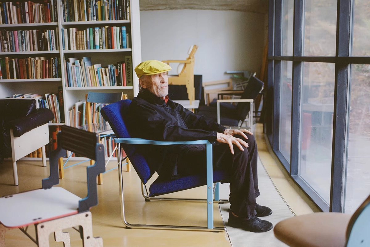 EXPERIMENT chair by Yrjö Kukkapuro reintroduced by Hem featuring innovative Finnish design with distinctive curved plywood construction