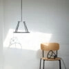 HISTORY pendant by Kasper Salto and Thomas Sigsgaard for FDB Møbler featuring design that references the brand's cooperative heritage