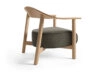 Dais lounge chair by Form Us With Love for Keilhauer featuring a sculptural backrest with three-dimensional skew design