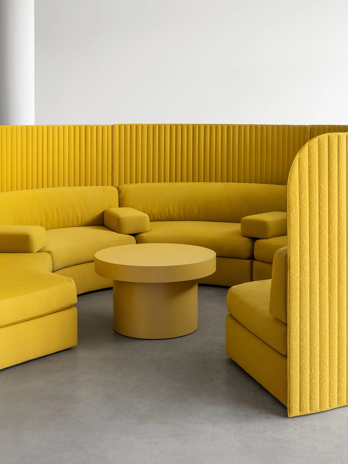 Focus Spaces modular sofa in open office setting, creating private meeting nooks within collaborative workspace