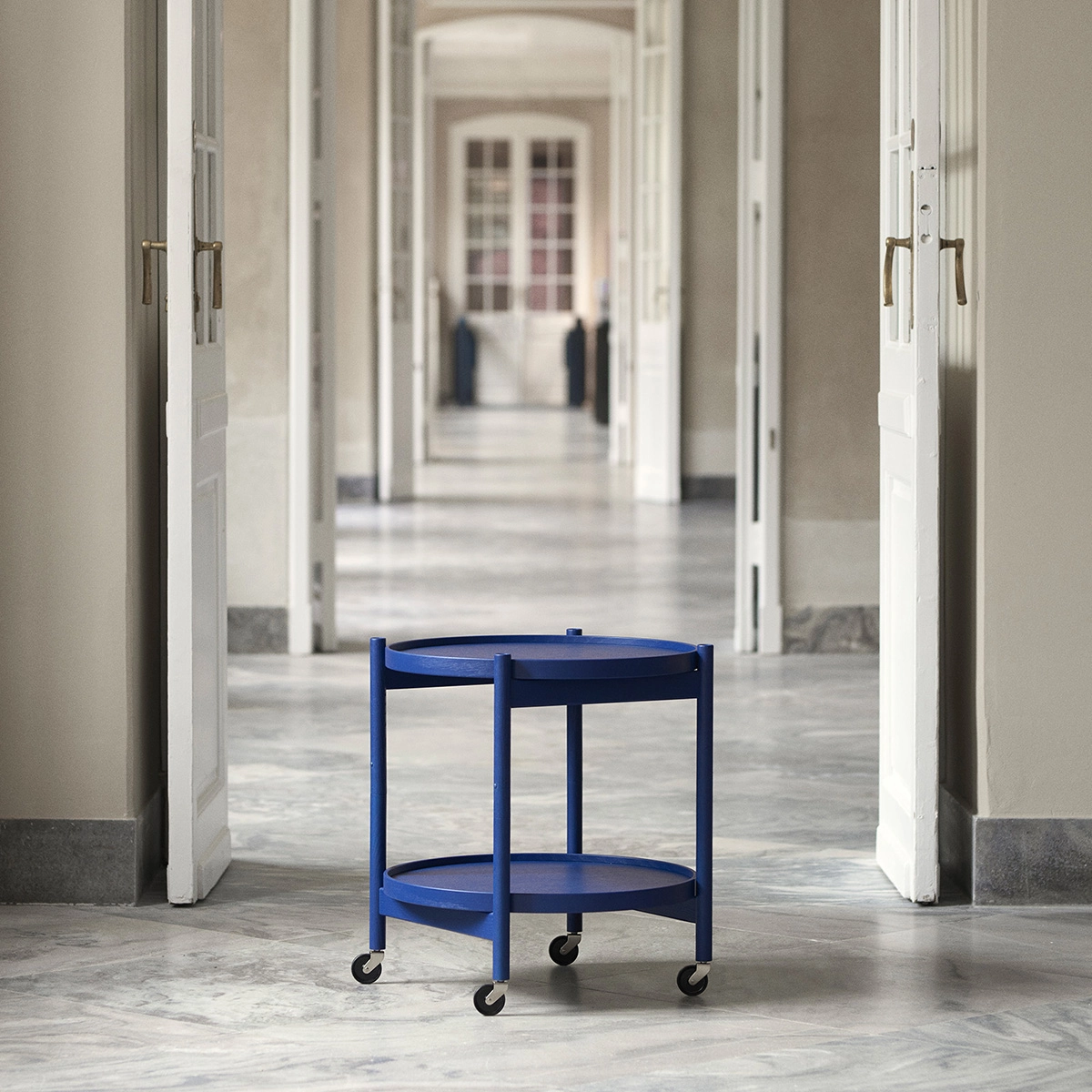 Hans Bølling's iconic Tray Table in Designmuseum Danmark's signature indigo blue, limited edition of 500 pieces