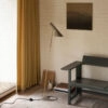 New editions of Arne Jacobsen classic lamp in black and warm grey by Louis Poulsen, featuring iconic Danish design elements