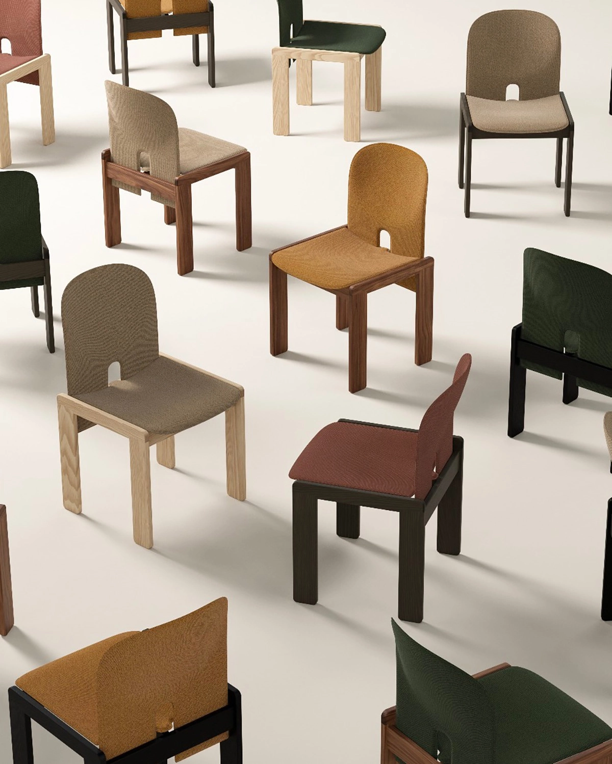 121 Scarpa dining chair by Karakter Copenhagen featuring wooden frame with leather upholstered seat and back in natural setting.