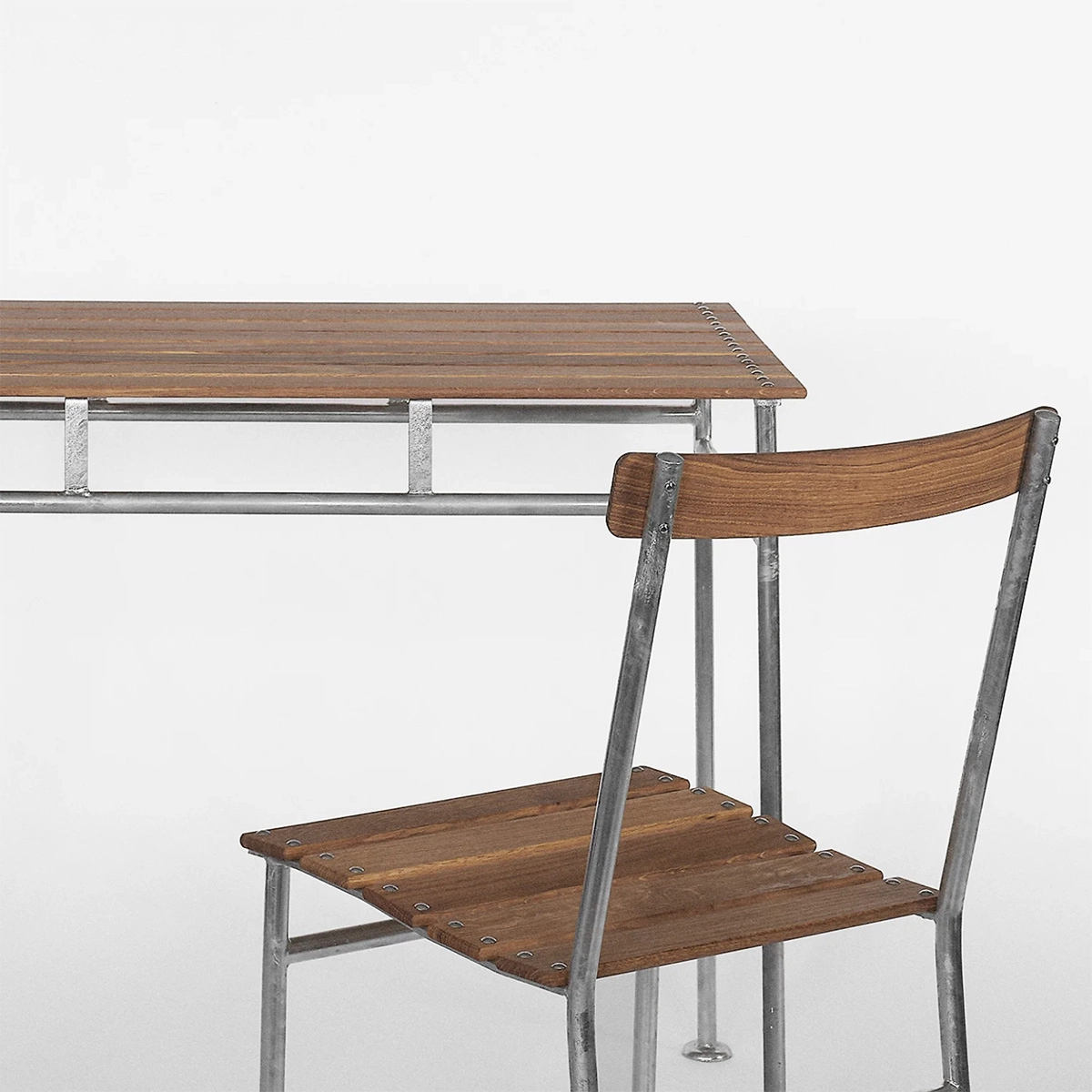 Stockholm Table by Tallum with galvanized steel frame and oak battens, inspired by 1930 Stockholm Exhibition