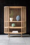Bastone cabinet by Antrei Hartikainen featuring rhythmic wooden dowels, now part of Nikari's collection
