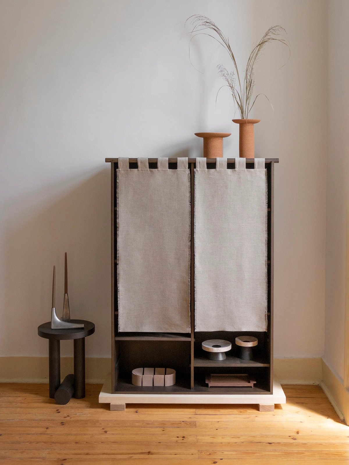 Veil Cabinet by Silje Nesdal for Origin Made featuring natural linen doors on a wooden frame, showcasing Scandinavian-Japanese fusion design.