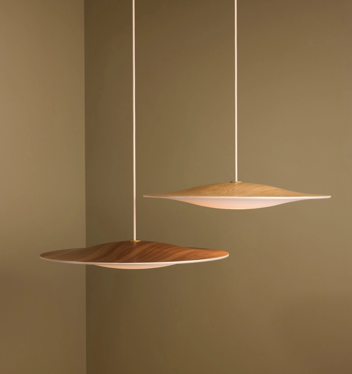 Sinus Wood pendant lamp by Piet Hein showcasing walnut finish and opal glass diffuser in modern interior