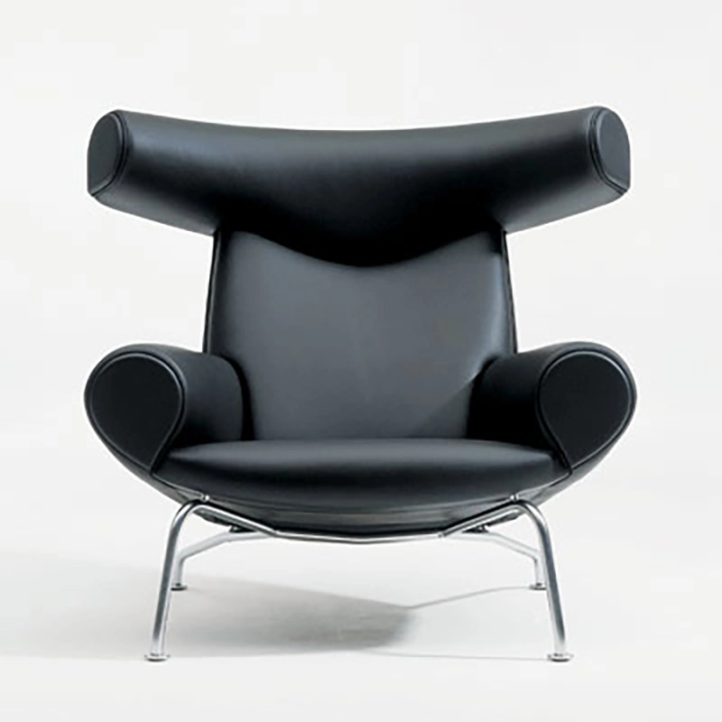 Hans J Wegner Ox Chair black leather Erik Jørgensen production showcasing sculptural design aesthetic