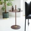 Cabaret side table by Peter Andersson for Klong with leather-wrapped pillar and brass details in black finish