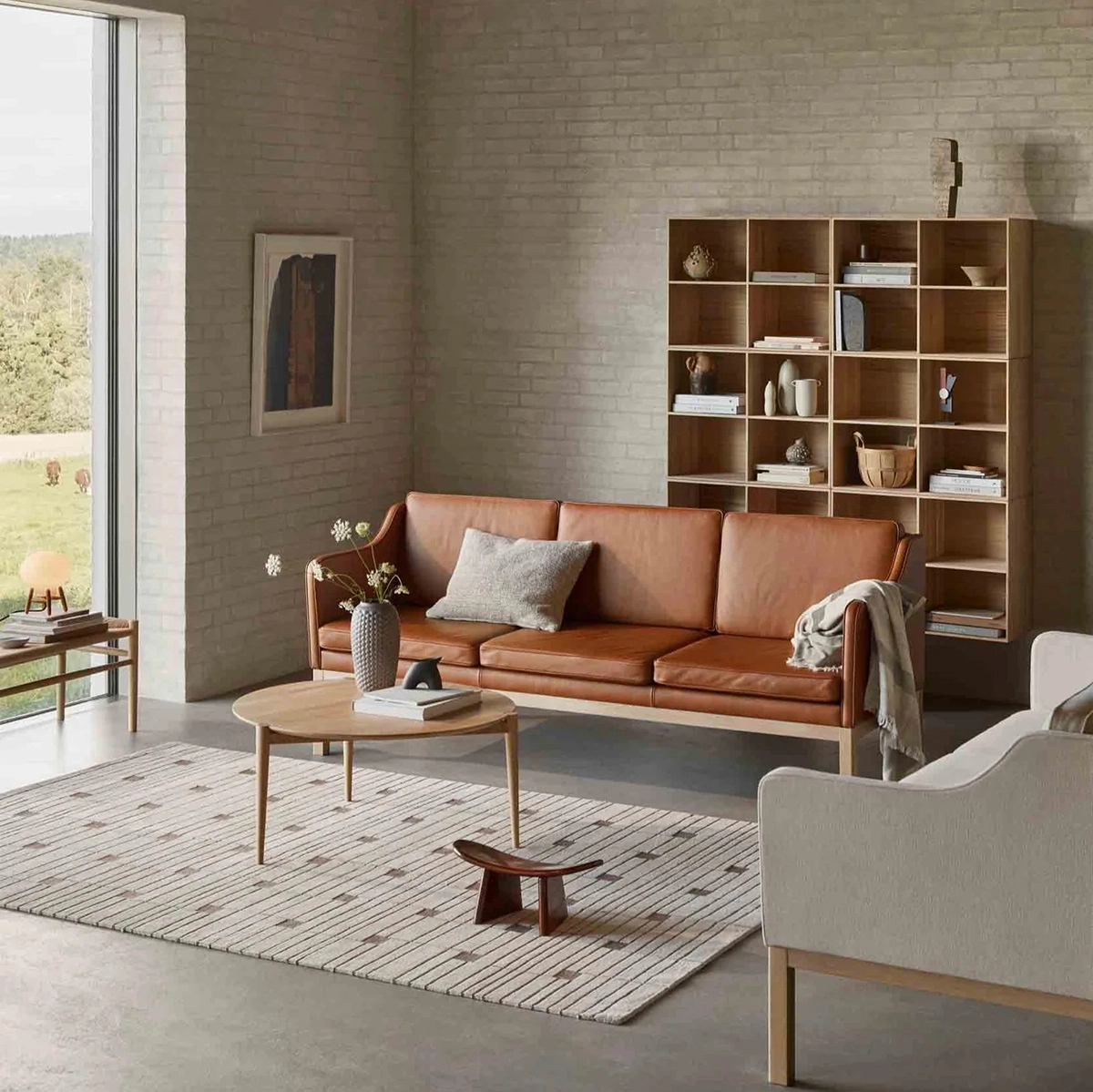 Discover the timeless elegance of the L43 sofa – a true masterpiece by Mogens Koch originally designed in 1947