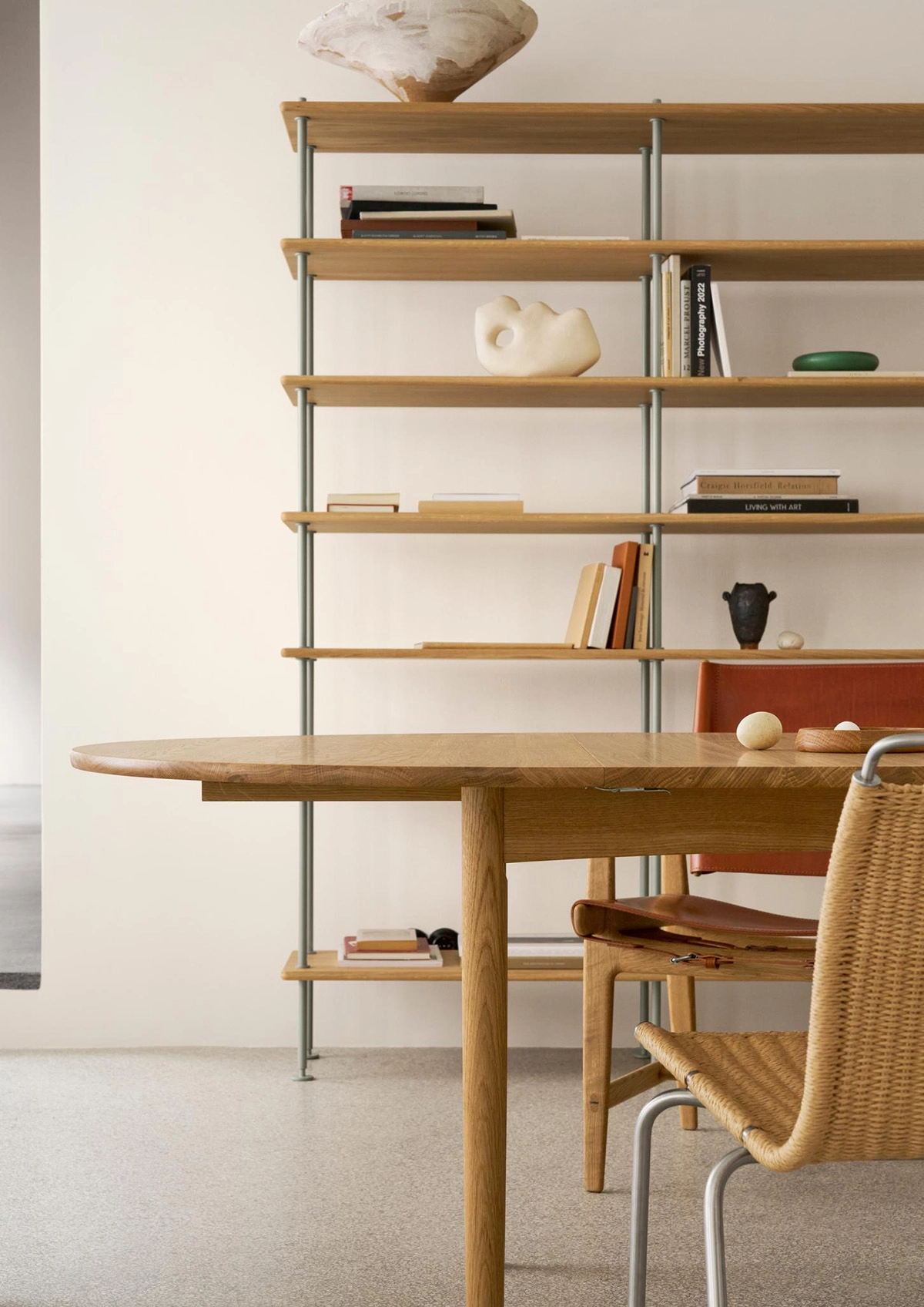 BM0121 coffee table with surrounding seating demonstrating its role as gathering point in contemporary living space