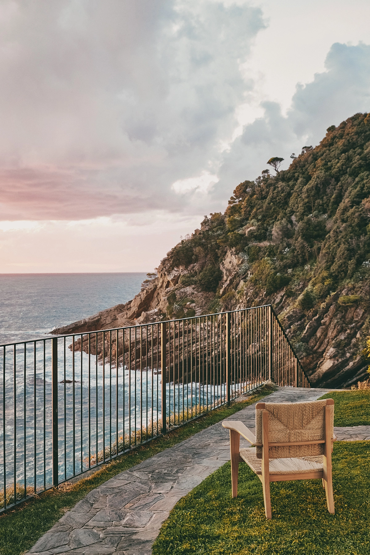 GUBI's revival of Marcel Gascoin's 1949 F-Chair design adapted for outdoor use with durable teak construction