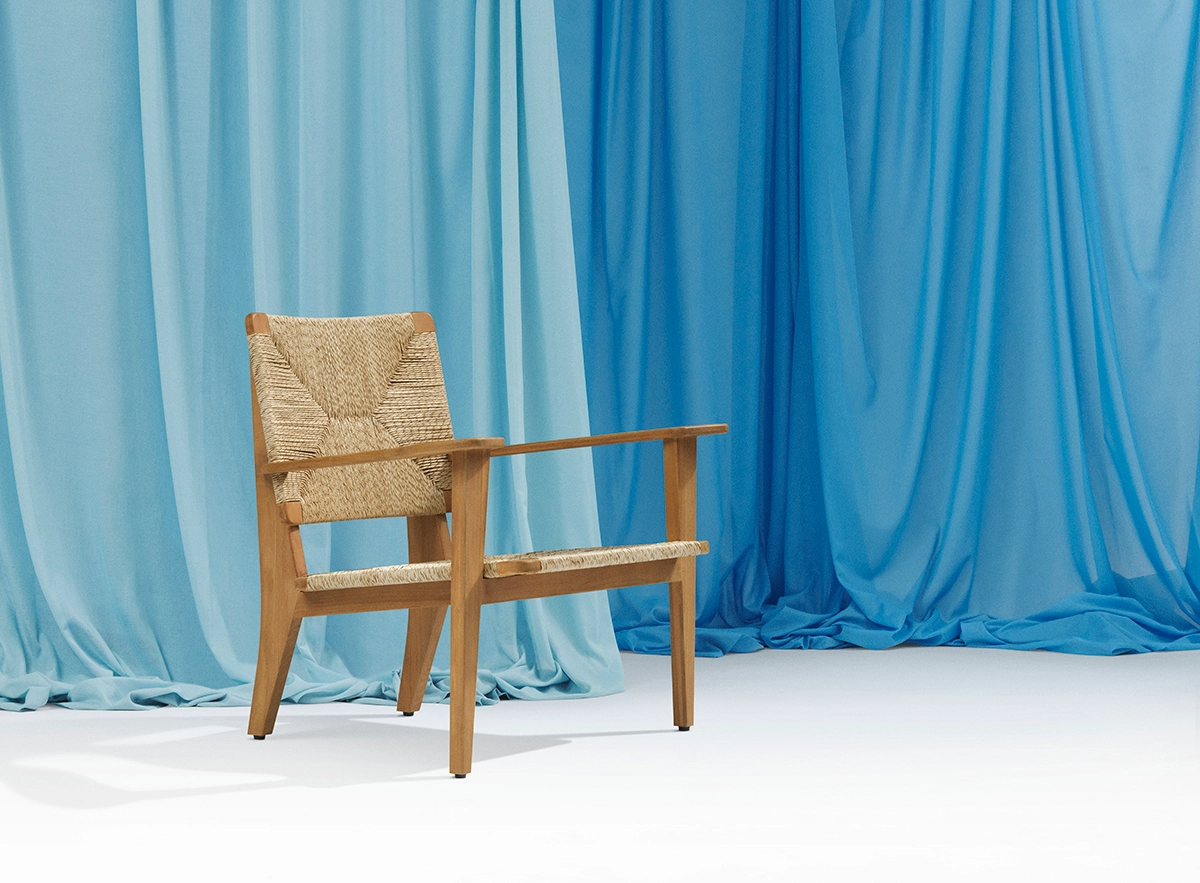 Side view of F-Chair Outdoor showing tapered rear legs and upright front legs characteristic of Gascoin's design