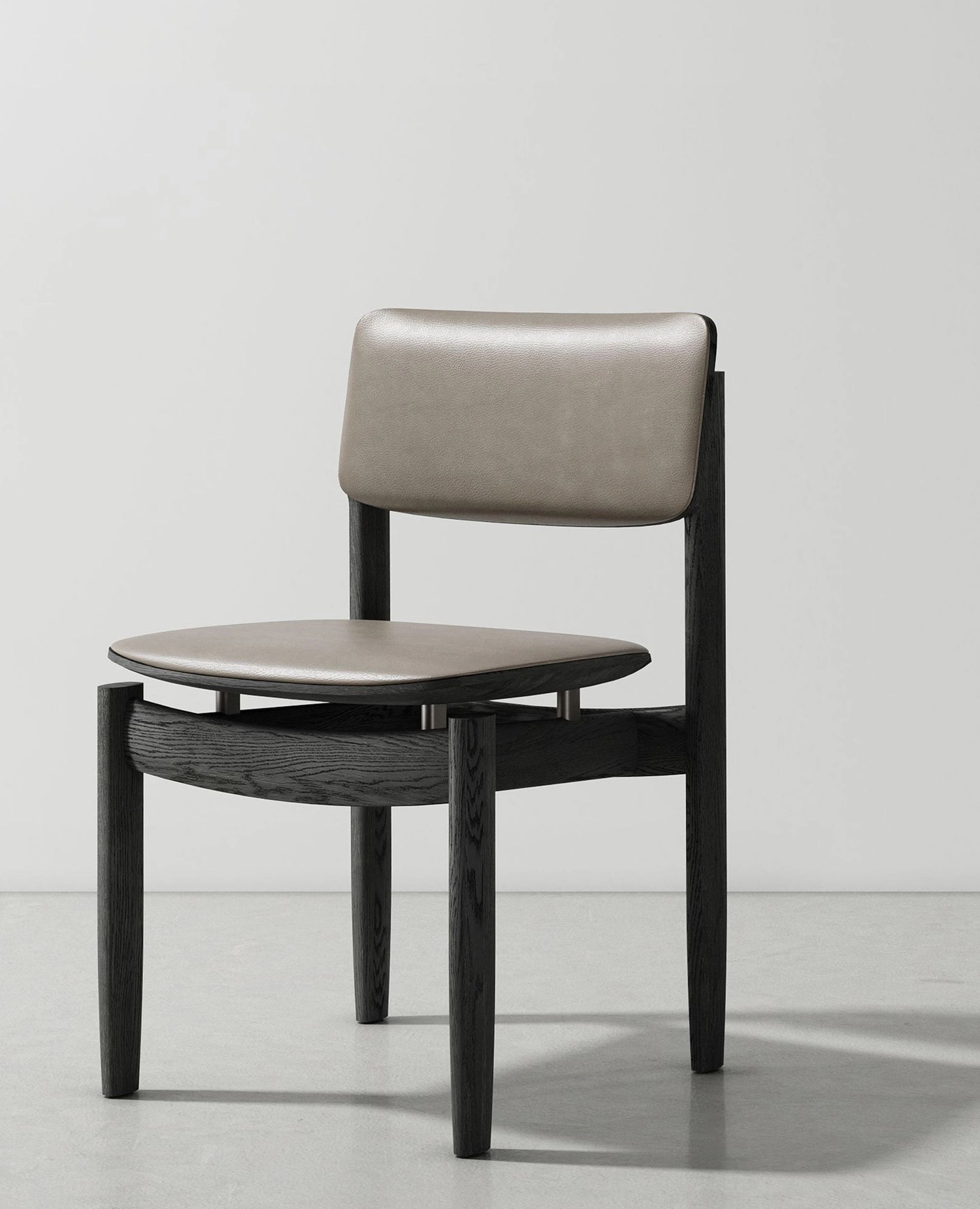 District Eight's Bow Chair highlighting the gravity-defying construction and ergonomic contours.