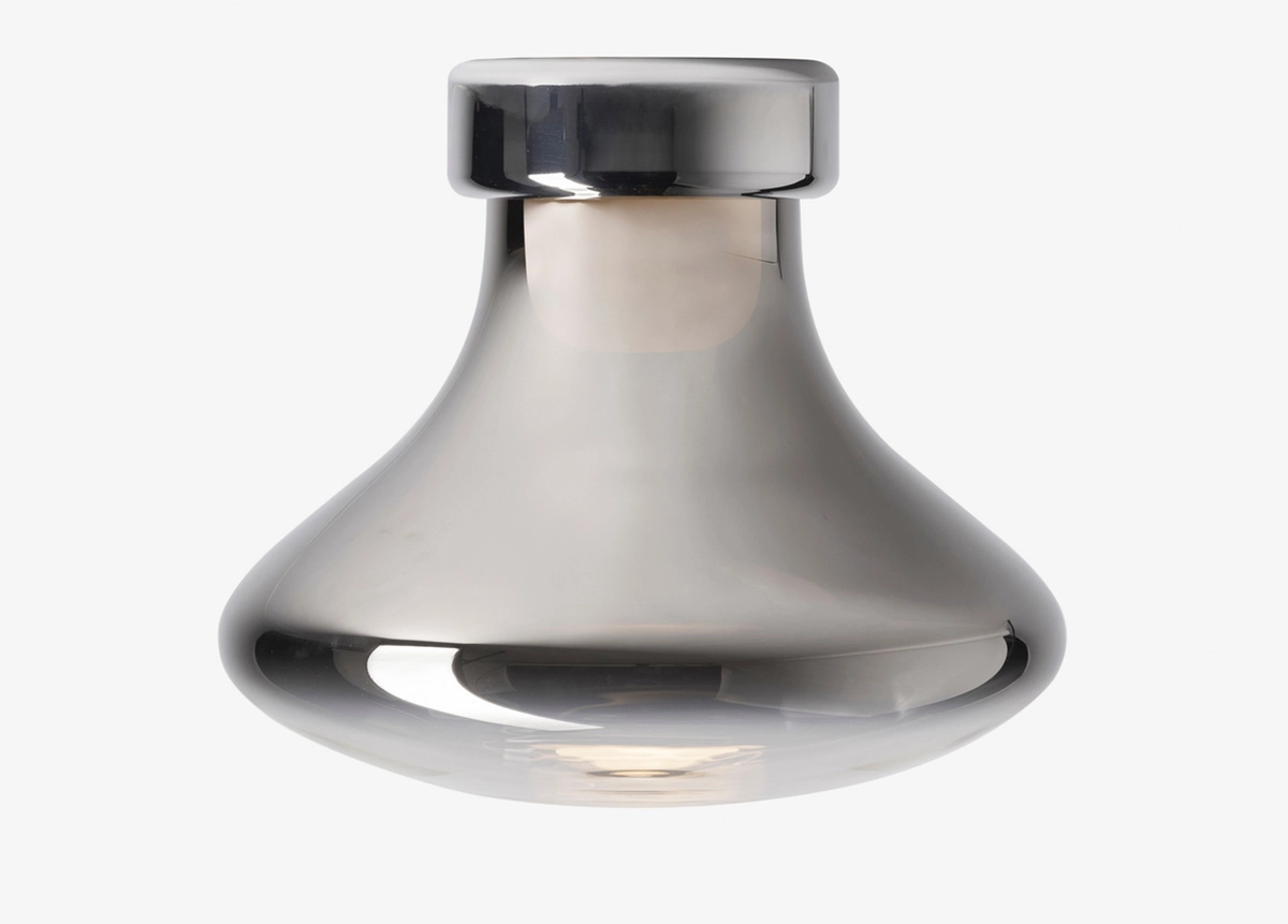 Organic-shaped Nebula lighting fixture with gradient metallic finish that dynamically mirrors surroundings even when unlit