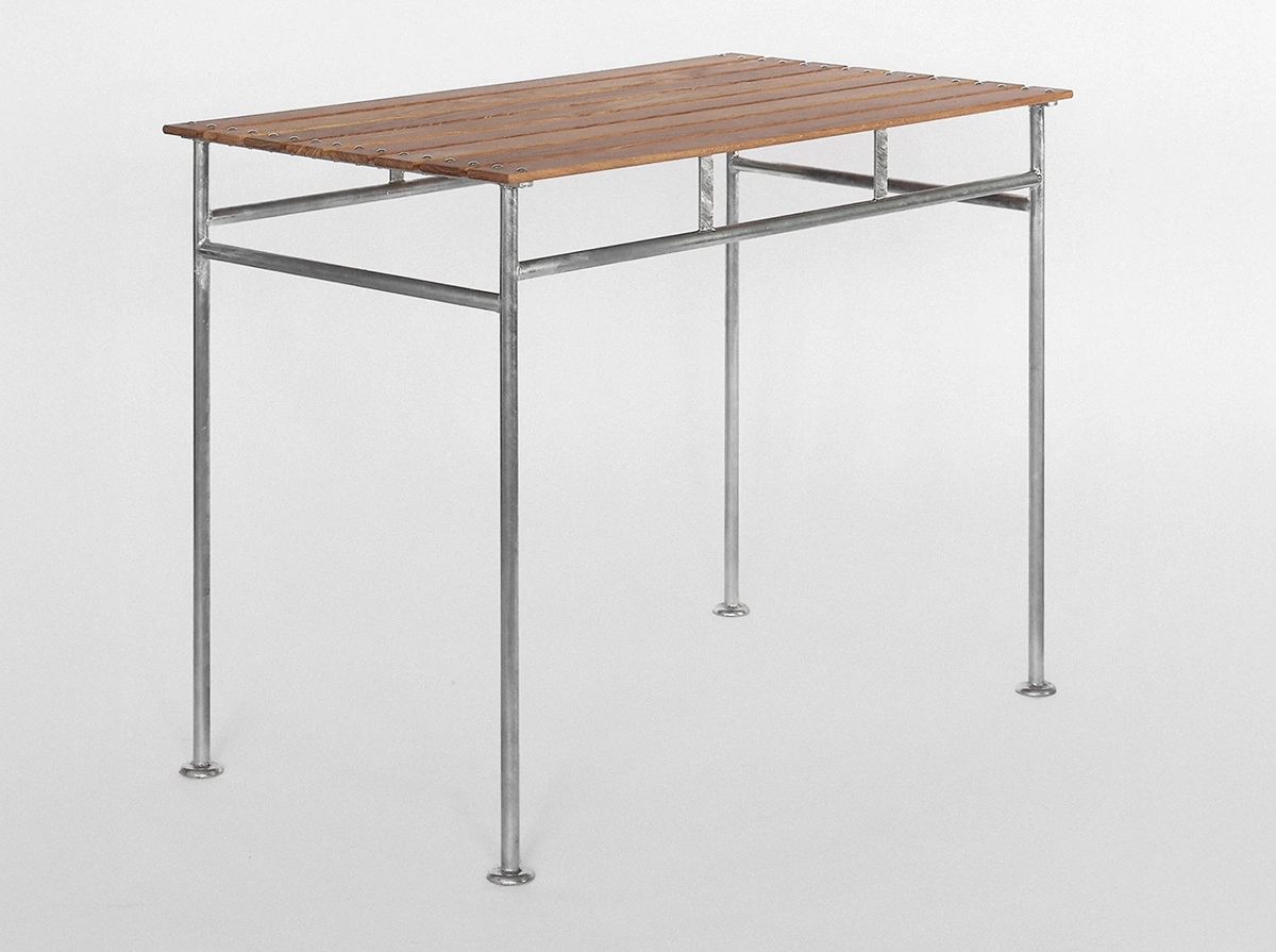 Stockholm Table outdoor furniture with characteristic bowl-shaped feet and linseed-oiled European oak top