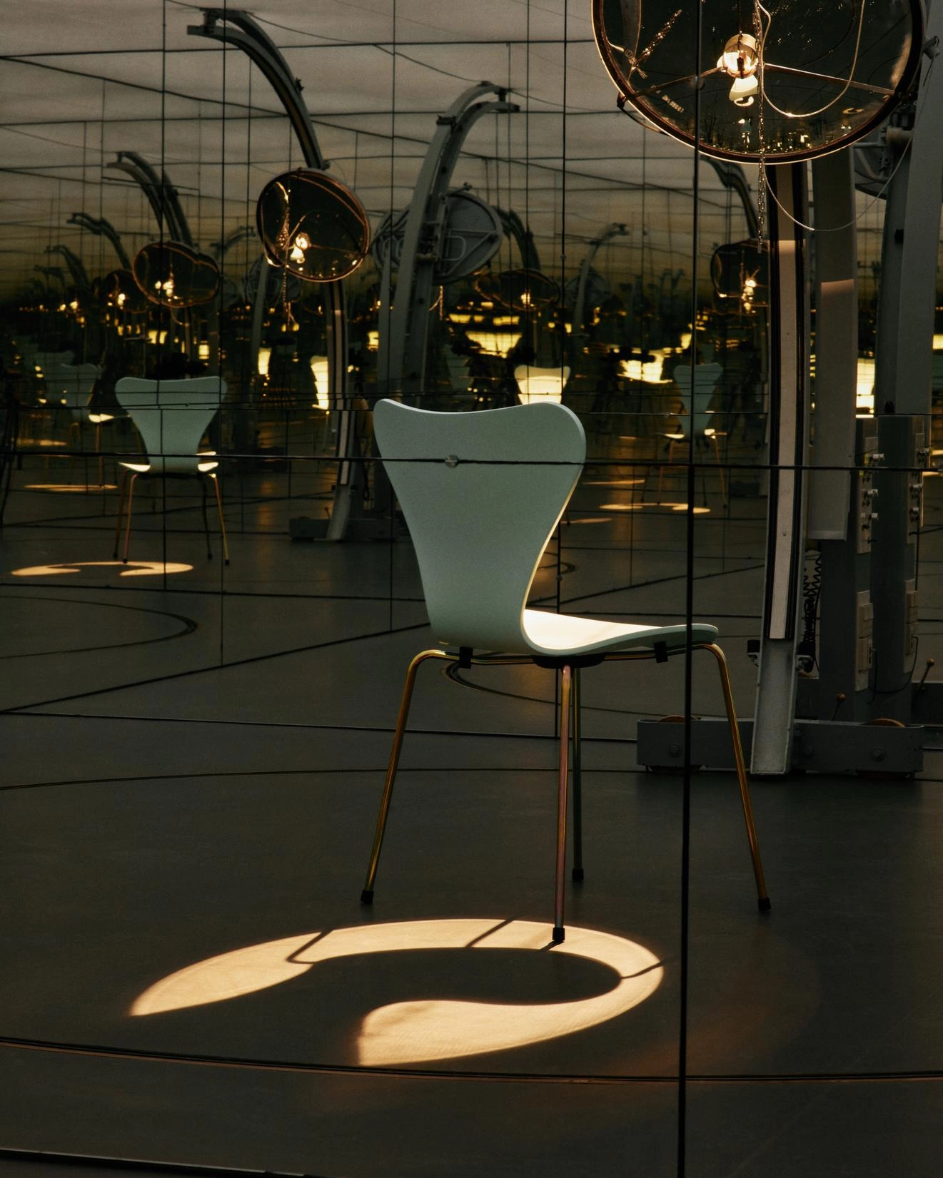 Fritz Hansen's limited edition Series 7 chair in beige with rainbow base styled in a contemporary Nordic dining area