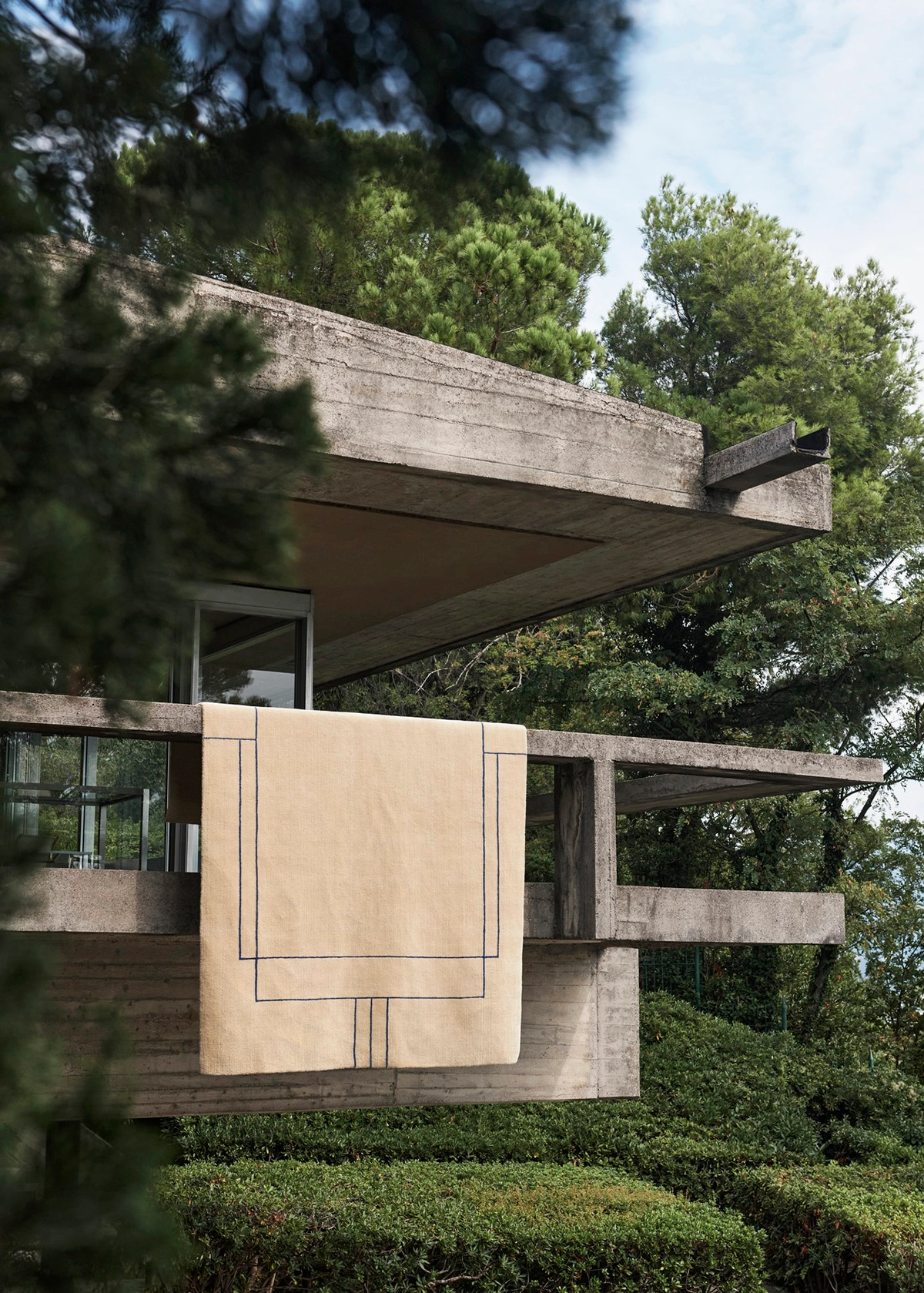 Cruise rug in Aden Desert Beige creating a sophisticated foundation beneath contemporary furniture arrangement