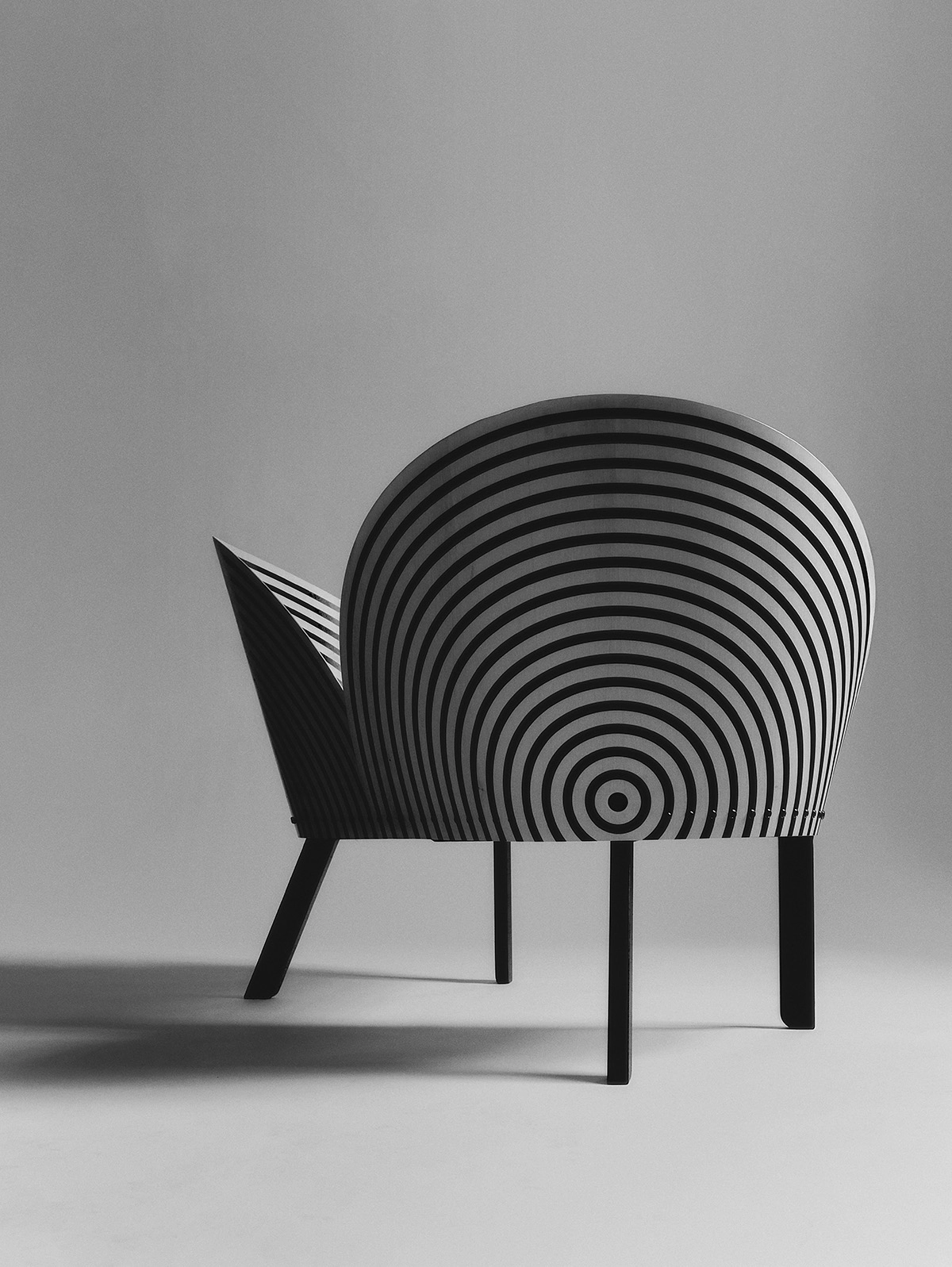 Minimalist side view of Nanna Ditzel sculptural bench highlighting geometric form and proportions