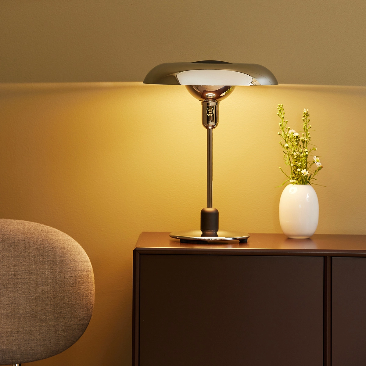 RA250 Anniversary chrome desk lamp illuminating modern workspace, showcasing optimal anti-dazzle lighting