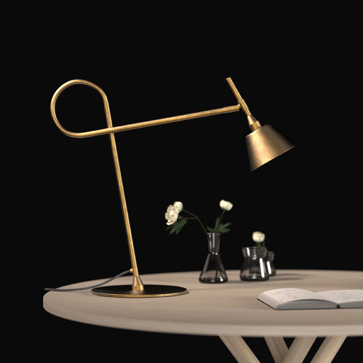 LOOP table lamp in raw brass demonstrating Swedish minimalist lighting design principles