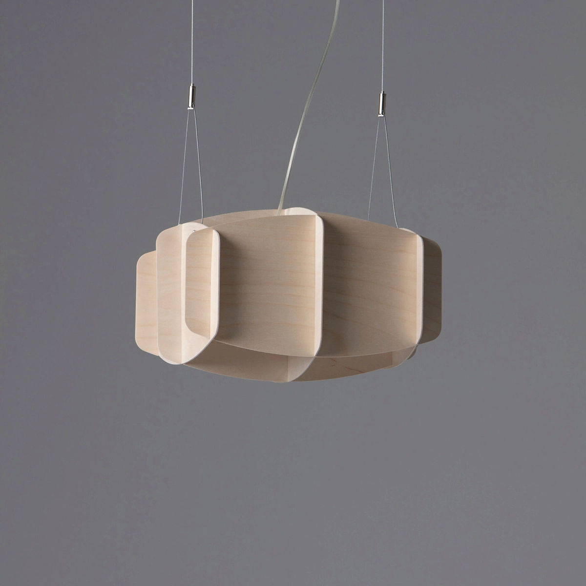 Side profile view of Ristikko architectural pendant lamp highlighting geometric birch construction